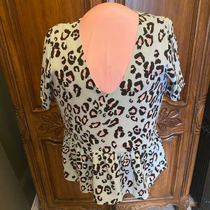 Carmela boutique top- size med- fits med or large.